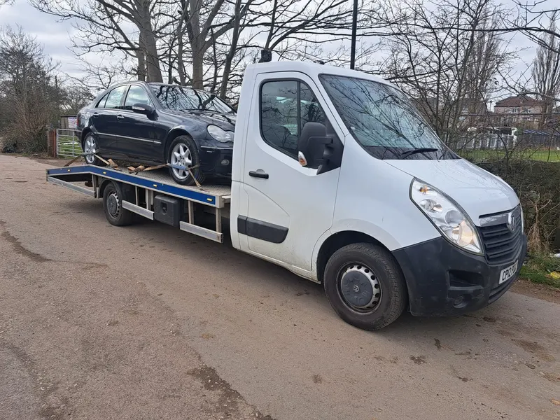 Recovery truck collecting a car bought for scrap in Penrith
